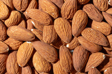 Scattered Almonds. Background from Almond Nuts. Natural High-Calorie Snacks
