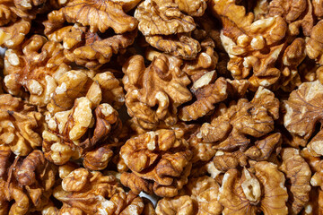 Scattered Shelled Walnuts. Background from Walnut. Natural High-Calorie Snacks