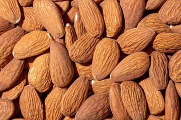 Scattered Almonds. Background from Almond Nuts. Natural High-Calorie Snacks