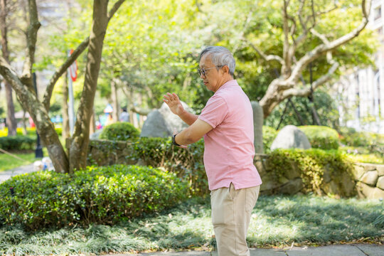 Senior man do taichi at the park