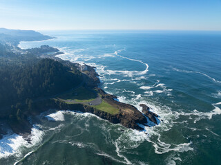 The Pacific Ocean washes against the rocky and rugged coastline of Oregon, not far south of Lincoln City. This part of the Pacific Northwest coast is incredibly scenic and accessed from highway 101.