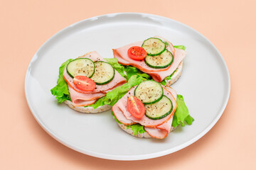Light Breakfast. Quick and Healthy Sandwiches. Rice Cakes with Ham, Tomato, Fresh Cucumber and...