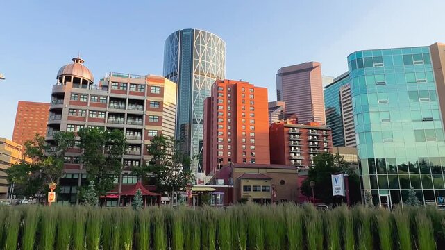 Street view of Dowtown Calgary and city skyscrapers on a beautiful summer day