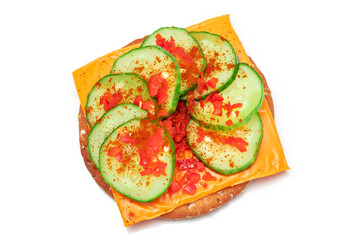 Crispy Cracker Sandwich with Fresh Cucumber, Cheese and Paprika - Isolated on White. Easy Breakfast. Quick and Healthy Sandwiches. Crispbread with Tasty Filling. Healthy Dietary Snack - Isolation