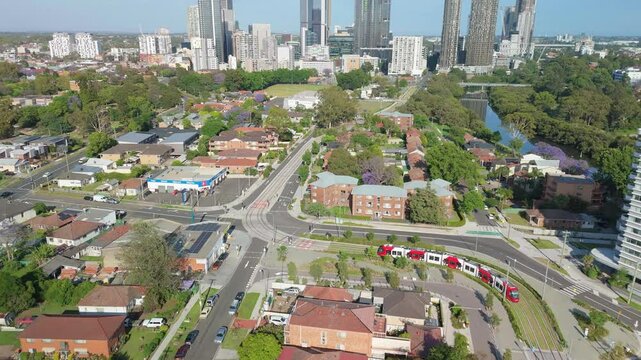 Aerial drone view of a light rail vehicle at Parramatta cbd in Western Sydney, NSW, Australia as it turns onto George Street in November 2024 