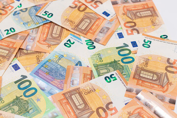 Different Euro Banknotes Money Background. Euro Money Currency. Colored Paper Money. A Lot of Fifty Euro Bills. Business, Finances, Cash and Money Saving Concept