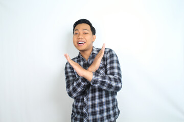 asian man show rejection signs with smiling face isolated on white background
