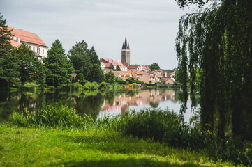 Fototapeta premium view of the old town over the lake or river