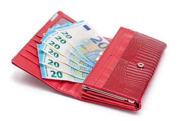 Opened Red Women Purse with 20 Euro Banknotes Inside - Isolated on White Background. A Wallet Full of Money Symbolizing Wealth, Success, Shopping and Social Status - Isolation