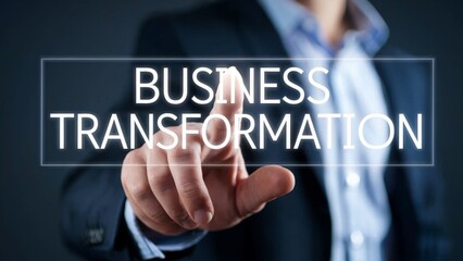 Finger pressing "Business Transformation" button symbolizing innovation and growth in modern business. Business innovation concept