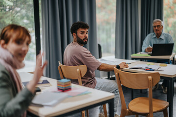 A diverse group of students attending a class in a comfortable and modern classroom setting. They are interacting and focused on their studies.