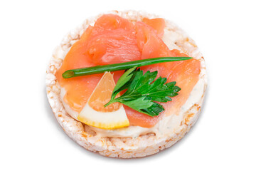 Rice Cake Sandwich with Fresh Salmon, Lemon and Greens - Isolated on White Background. Diet Food. Quick and Healthy Sandwiches. Crispbread with Fresh Fillings. Healthy Dietary Snack