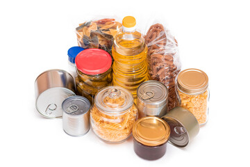 Food Reserves: Canned Food, Spaghetti, Pate, Tuna, Tomato Juice, Pasta, Fish and Grocery - Isolated on White Background. Emergency Food Storage in Case of Crisis. Strategic Food Supplies - Isolation