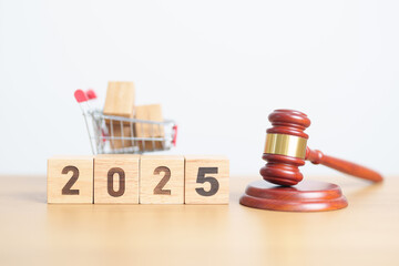 Happy New Year 2025 with Judge gavel and shopping cart. auction and bidding, Trade Regulations,...