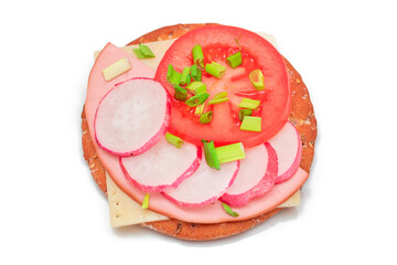 Crispy Cracker Sandwich with Tomato, Sausage, Cheese, Green Onions and Radish - Isolated on White. Easy Breakfast. Diet Food. Quick and Healthy Sandwiches. Crispbread with Tasty Filling - Isolation