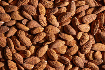 Scattered Almonds. Background from Almond Nuts. Natural High-Calorie Snacks