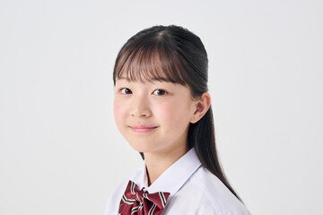 白背景,日本人女子中学生,笑顔