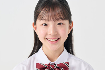 白背景,日本人女子中学生,笑顔