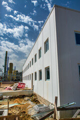 Early Construction Phase with Workers and Equipment on Site