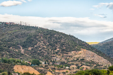 Glenwood Springs, Colorado city mountain town with houses homes by mountains nature landscape at...