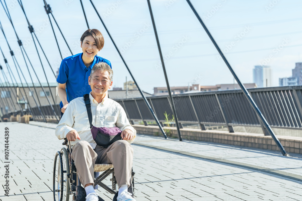 Poster 介護、車椅子、ヘルパー、介護士、笑顔、歩道、外出、ボランティア、サポート、支援、高齢者、お年寄り、シニア、道路、屋外、リハビリ、女性、男性、日本人、サービス、デイサービス、ホームヘルパー、介護福祉士、老人ホーム、障害、障がい者、介護員、青空、元気、ポジティブ、街、都市、社会、橋、ウェルネス、健康、老後、バリアフリー、明るい、散歩、外出レク、福祉、介助、老人、押す、スタッフ、デイケア、施設、カメラ目