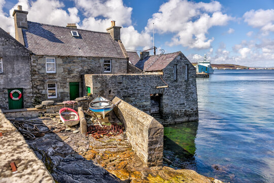 Lerwick, Shetland Islands: - August 14, 2024: Buildings along the shores of Lerwick in Scotland's Shetland Islands
