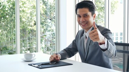 Businessman hands note meeting document in conference room. man Hands writing planning notebook. Close up male hand holding pencil write on diary sketchbook at office desk. Business Planning Concept