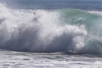 wave breaking on the shore