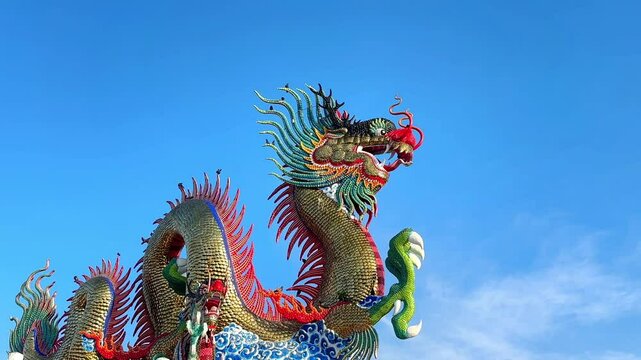 The Chinese Dragon Statue with blue sky in Nakhon Sawan Park