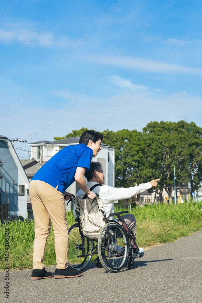 Aufkleber 介護、介護士、車椅子、高齢者、お年寄り、シニア、日本人、男性、外出、フレイル、後ろ姿、背中、歩道、自然、青空、公園、住宅街、デイサービス、ホームヘルパー、笑顔、ポジティブ、ボランティア、車いす、障がい者、障害、介護福祉士、ウェルネス、サポート、サービス、支援、屋外、レク、施設、老人ホーム、散歩、新緑、環境、仕事、職業、アルバイト、コピースペース、元気、老人、ヘルスケア、デイケア、ヘルパー、指さす、