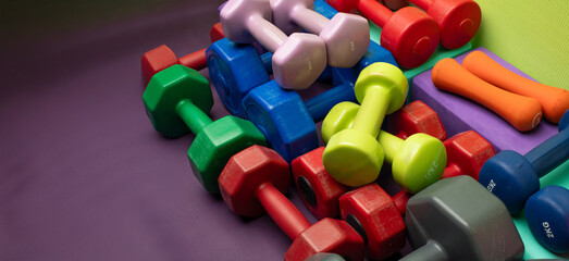 fitness background with accessories and dumbbells