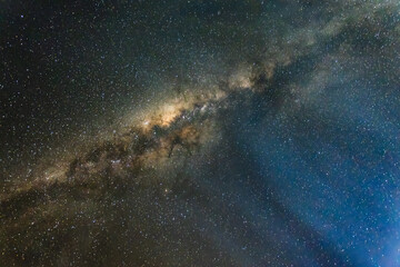 A stunning night sky filled with countless stars and the majestic Milky Way galaxy. It is a remote location known for its minimal light pollution. Isalo National Park, Madagascar.
