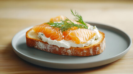 Open faced sandwich with smoked salmon and cream cheese on toasted bread, garnished with fresh dill. delicious and healthy option for breakfast or snack