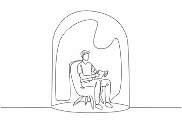World Introvert Day. Continuous single line draw of young lonely man reading book while sitting on sofa chair inside glass dome. Loneliness guy looking for peace. Psychological problems, mental health