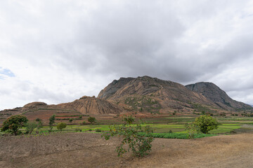 A stunning view of the rugged terrain and unique rock formations of Isalo National Park. The park's geological formations date back to the Jurassic period. Isalo National Park, Madagascar.