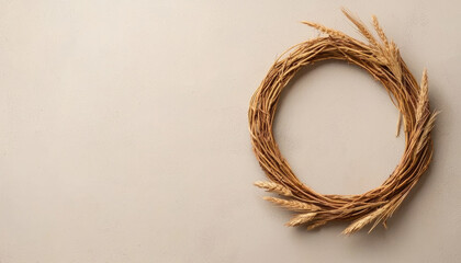 A minimalist wreath made of wheat, perfect for rustic decor and seasonal themes.