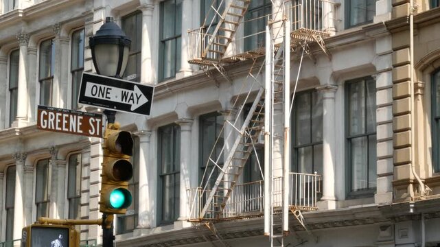New York City Manhattan Soho fashion district, Greene street near Broadway. USA urban building, old classic american architecture. Shopping in NYC, United States. Business and residential real estate.