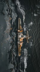 Aerial View of Plane Wreck Partially Buried in Black Sand