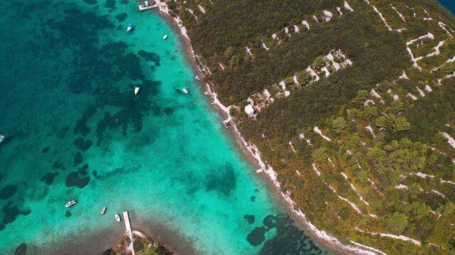 Boats At Kneza Harbour In Kneza Bay Near Korcula Town, Croatia. Aerial Topdown Shot