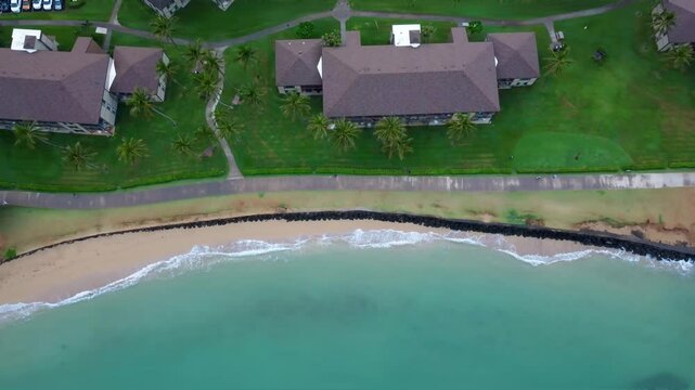 Aerial view of Kapaa Beach Park. Top View of kappa beach in Kauai Hawaii. Cinematic Aerial Hawaiian beach