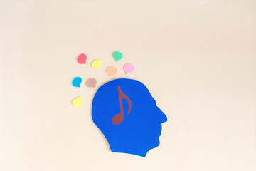 The silhouette of a human head with the image of a note and the problem of choice in the flow of different information. A person receives information from different sources