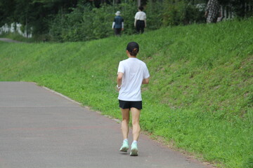 Image of a person jogging on the Daecheongcheon Trail