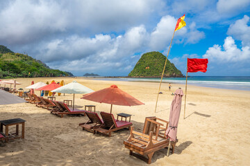 Beautiful tropical beach on Red Island (Pulau Merah) coast