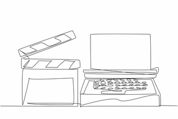 Single one line drawing clapper and typewriter side by side. Creates scripts. Helps synchronize images and sound. Equipment. National Screenwriters Day. Continuous line design graphic illustration