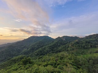 landscape with clouds and sun