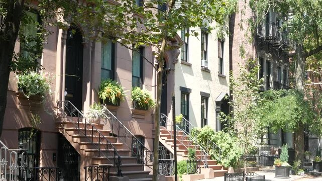 New York City townhouse building, Brooklyn Heights residential district, USA. Brownstone urban architecture, attached house. United States real estate, american property, apartments and homes in NYC.