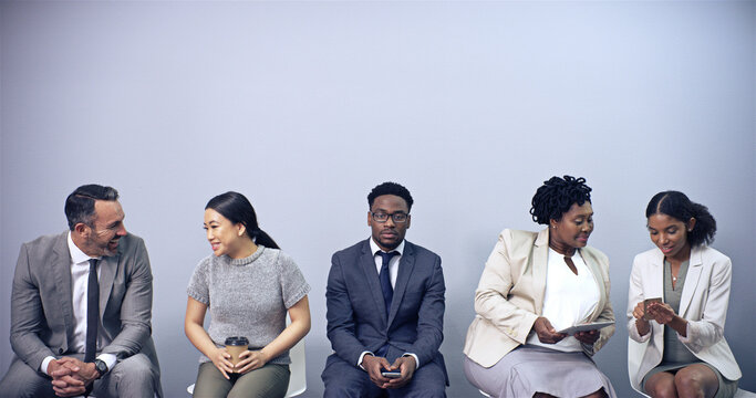 Man, portrait and queue for interview at office with diversity, networking or onboarding at recruitment company. Person, row and waiting room for human resources, people and mock up space at agency