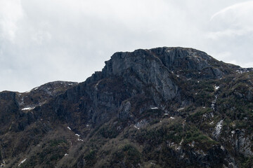 The view from the top of a cliff face in Gros Morne offers a breathtaking panorama of the rugged landscape, showcasing the stunning natural beauty of this iconic national park.