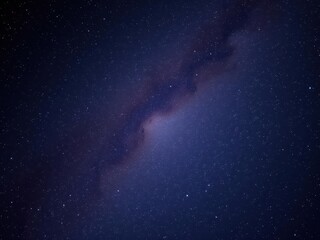 Fototapeta premium Night sky filled with sparkling stars against a black backdrop, cosmic, milky way, galaxy