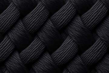 Fototapeta premium Intertwined black fibers creating textured pattern